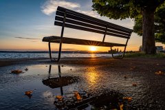 Sonnenuntergang mit Bank